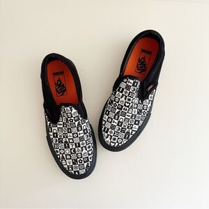 Vans x Cult Black Checkerboard Slip-On Pro BMX sneakers